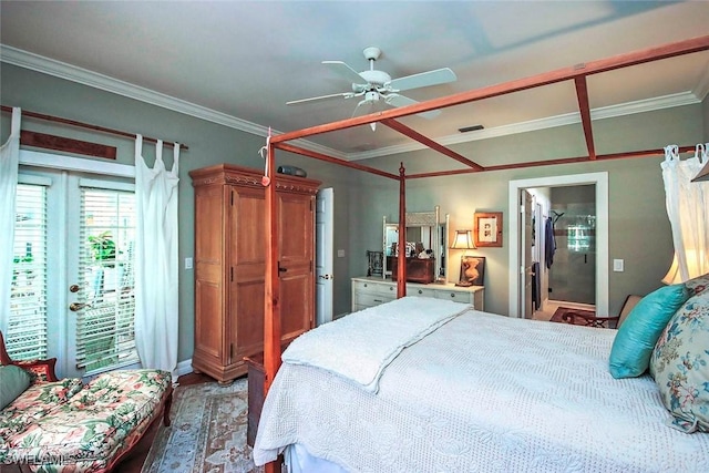 bedroom featuring visible vents, ornamental molding, and wood finished floors