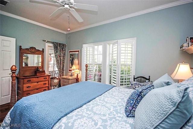 bedroom featuring visible vents, dark wood-style flooring, and ornamental molding