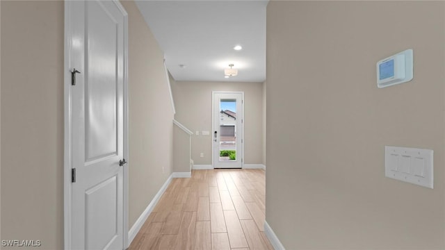 4568 Centaurus Cir, Naples, FL 34120 - corridor with baseboards, light wood-type flooring, and recessed lighting