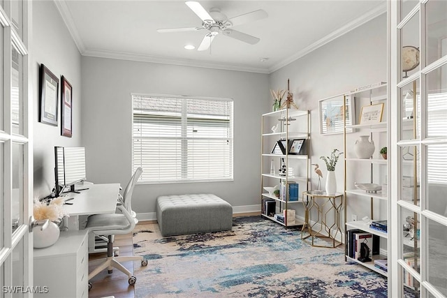 home office featuring ornamental molding, wood finished floors, a ceiling fan, and baseboards