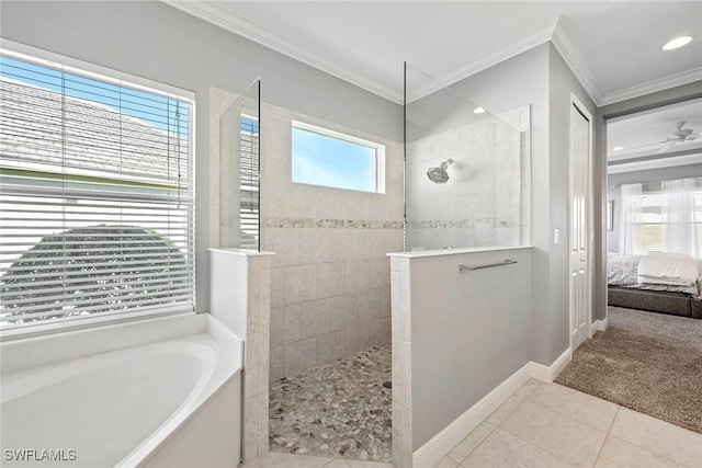 ensuite bathroom with tile patterned flooring, crown molding, ensuite bath, and walk in shower