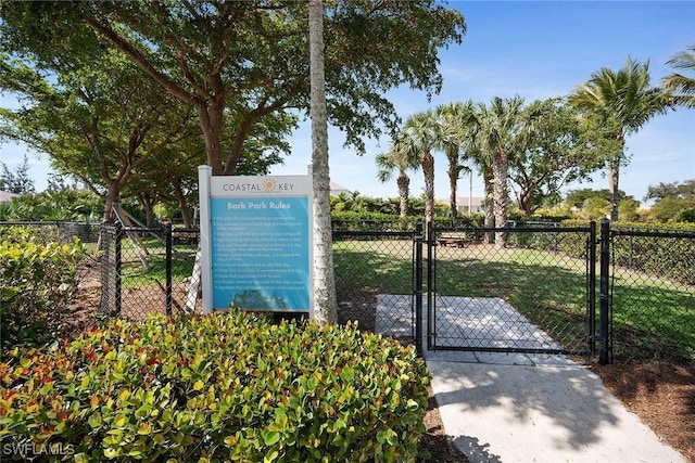 exterior space with a gate and fence