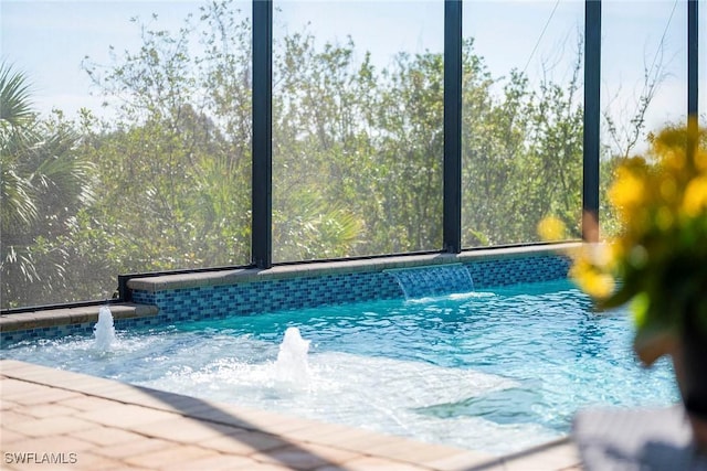 pool featuring glass enclosure