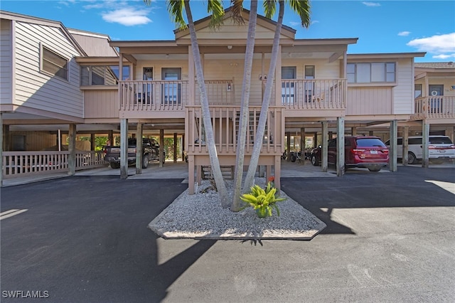 exterior space featuring covered parking