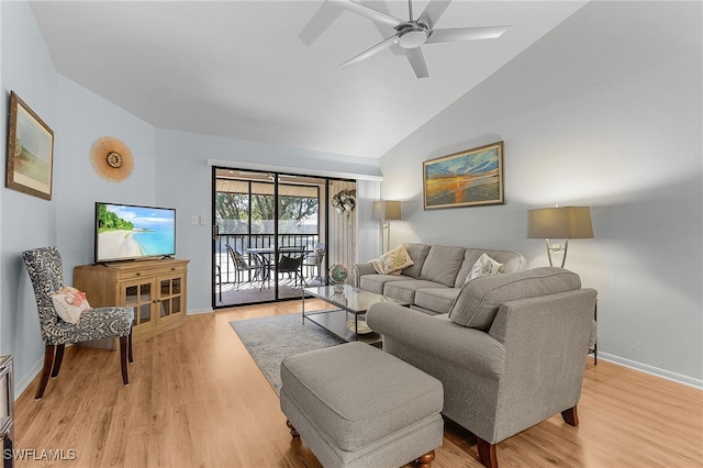 7629 Captains Harbor Dr Unit 1203, Bokeelia, FL 33922 - living room featuring high vaulted ceiling, light wood finished floors, a ceiling fan, and baseboards