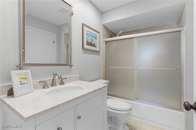7629 Captains Harbor Dr Unit 1203, Bokeelia, FL 33922 - full bath with toilet, shower / bath combination with glass door, and vanity