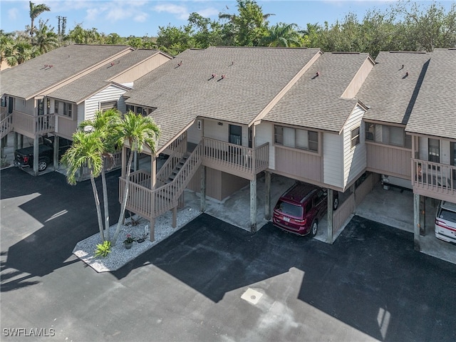 7629 Captains Harbor Dr Unit 1203, Bokeelia, FL 33922 - drone / aerial view featuring a residential view
