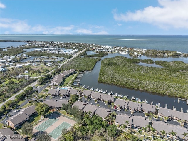 7629 Captains Harbor Dr Unit 1203, Bokeelia, FL 33922 - drone / aerial view featuring a water view and a residential view