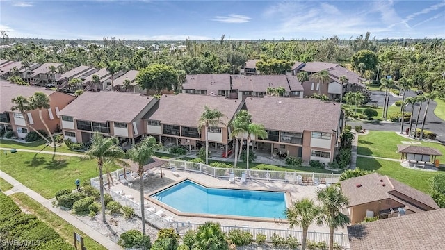 7629 Captains Harbor Dr Unit 1203, Bokeelia, FL 33922 - pool with a patio, fence, and a residential view