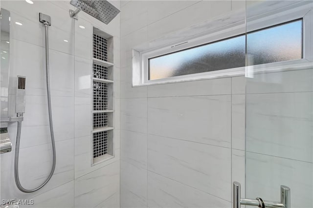 bathroom featuring a shower stall