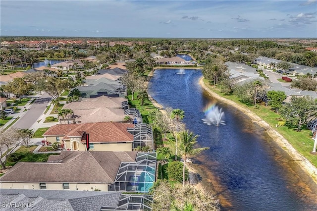 bird's eye view with a water view and a residential view