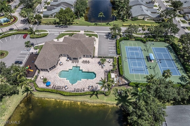 bird's eye view featuring a residential view and a water view