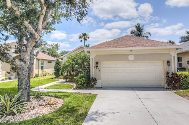 8074 Tauren Ct, Naples, FL 34119 - single story home with a front yard, roof with shingles, stucco siding, an attached garage, and driveway