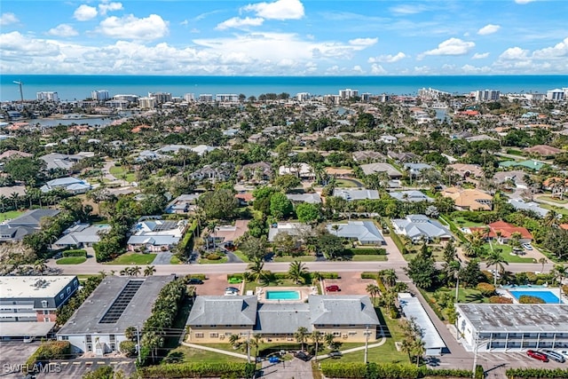 drone / aerial view with a water view