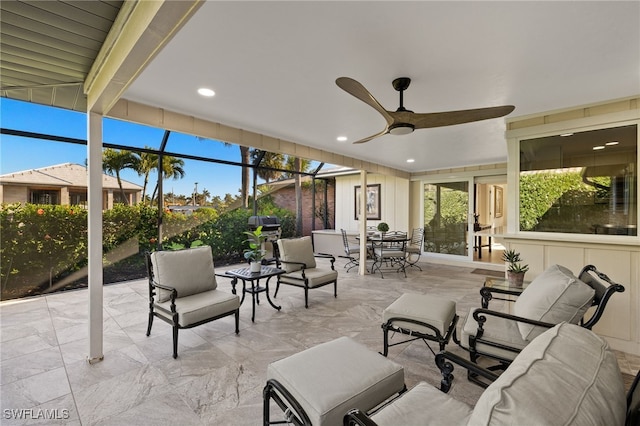 1525 Osprey Ave, Naples, FL 34102 - view of patio / terrace with outdoor dining area, ceiling fan, and a lanai