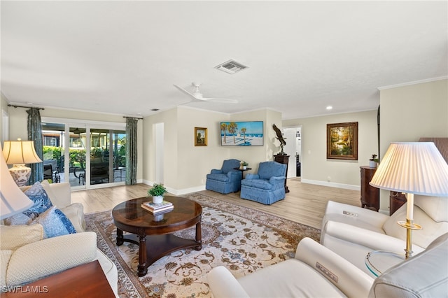 1525 Osprey Ave, Naples, FL 34102 - living area with wood finished floors, ornamental molding, and recessed lighting