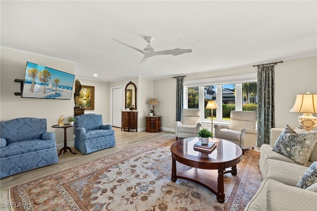 1525 Osprey Ave, Naples, FL 34102 - living area featuring ornamental molding, a ceiling fan, and wood finished floors