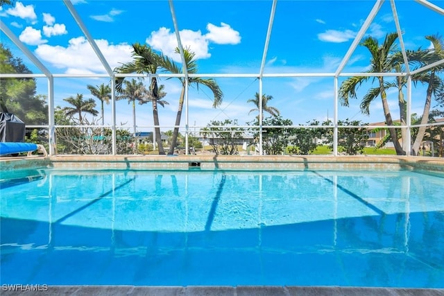 outdoor pool featuring a lanai