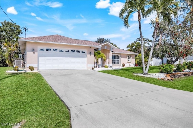 ranch-style house with a garage, a front yard, concrete driveway, and stucco siding