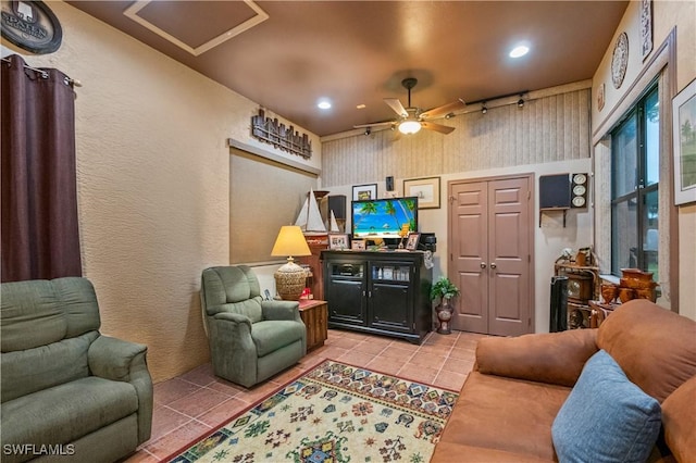 tiled living room with recessed lighting and a ceiling fan