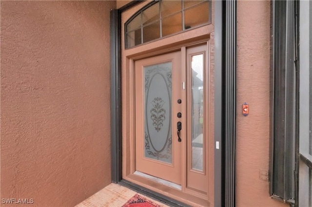 2725 SW 28th Pl, Cape Coral, FL 33914 - property entrance with stucco siding