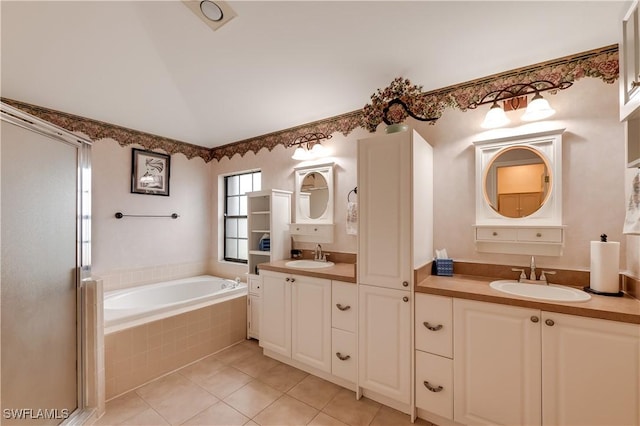 2725 SW 28th Pl, Cape Coral, FL 33914 - bathroom with a garden tub, tile patterned flooring, and vanity