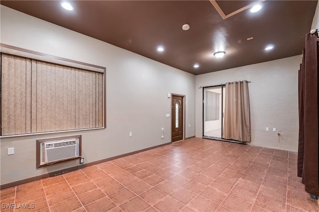 2725 SW 28th Pl, Cape Coral, FL 33914 - unfurnished room featuring a wall mounted air conditioner and recessed lighting
