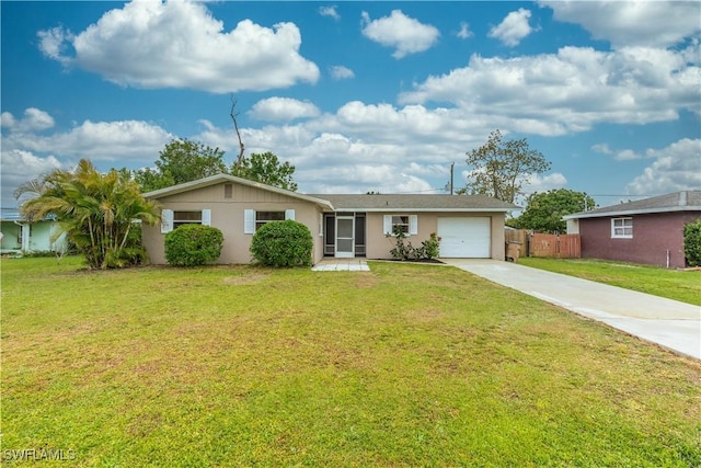 ranch-style house with an attached garage, concrete driveway, a front lawn, and fence