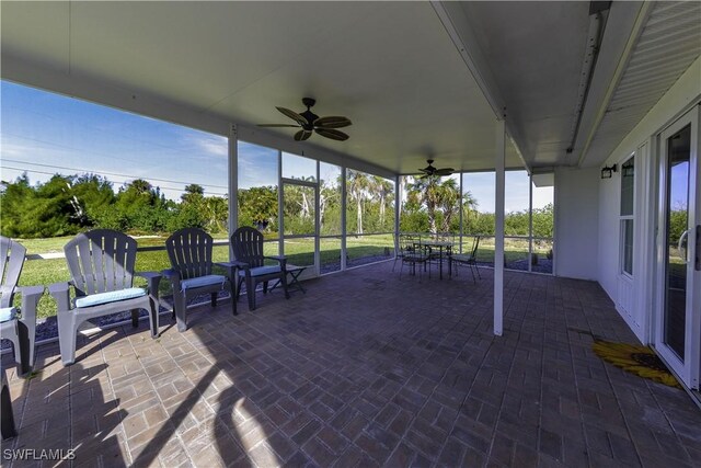 view of patio / terrace with outdoor dining space and a ceiling fan