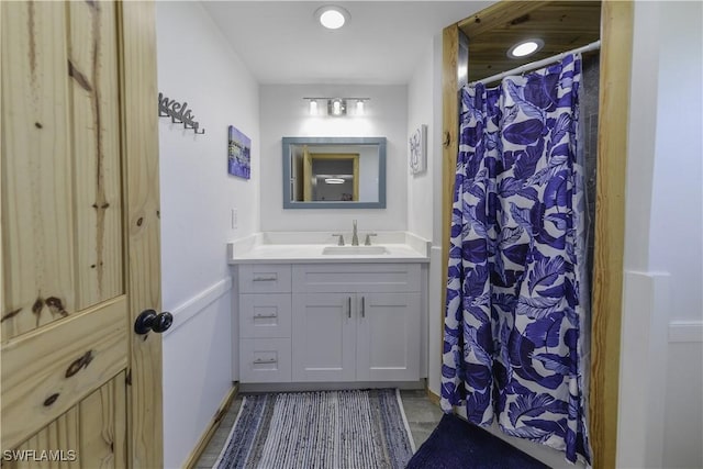 full bathroom featuring vanity and a shower with shower curtain