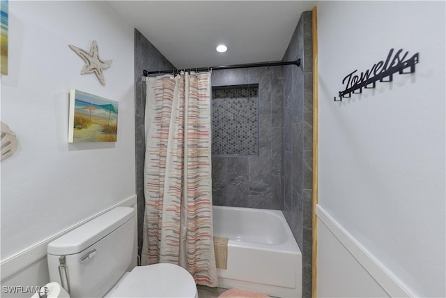 full bathroom with shower / bath combination with curtain and toilet