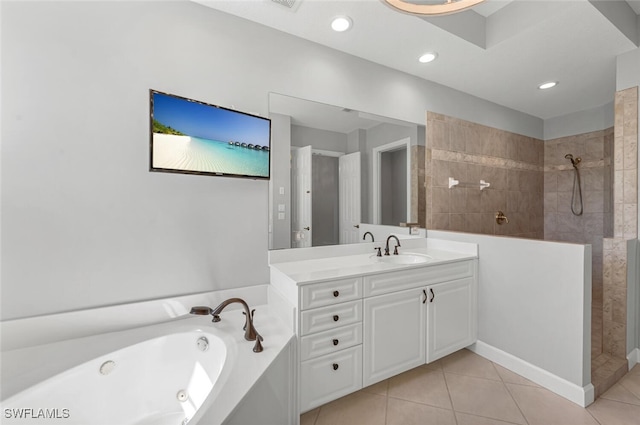 full bathroom with tile patterned floors, a jetted tub, vanity, and walk in shower