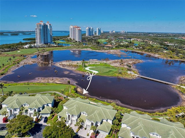 drone / aerial view with a water view and a city view