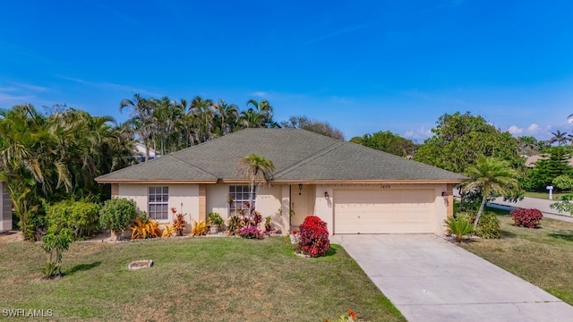 single story home featuring a front yard, concrete driveway, an attached garage, and stucco siding