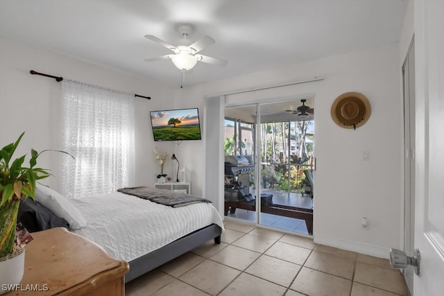 bedroom featuring access to exterior, ceiling fan, and baseboards