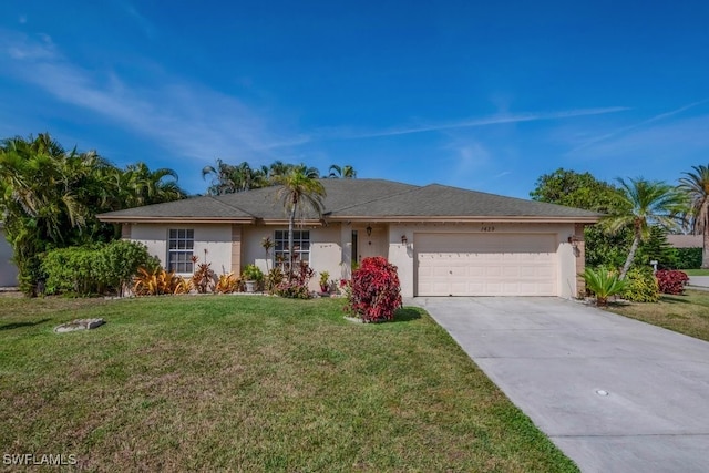 ranch-style home featuring concrete driveway, an attached garage, a front lawn, and stucco siding