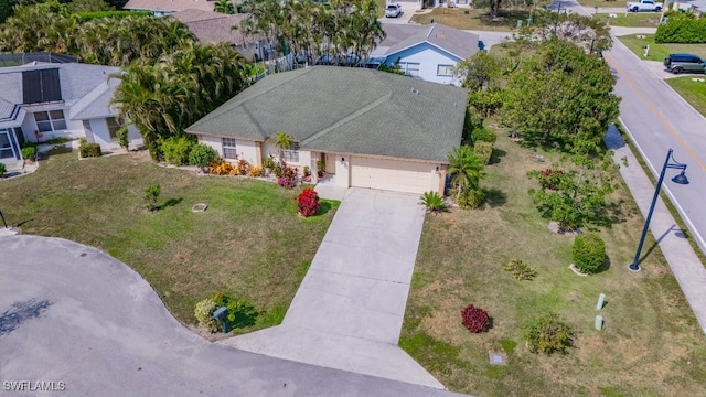 birds eye view of property with a residential view