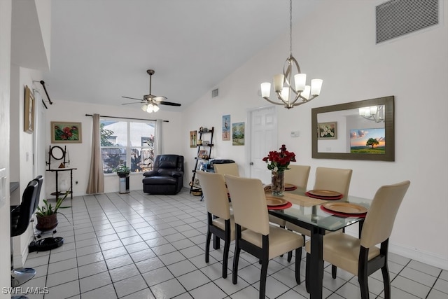 dining area featuring light tile patterned floors, visible vents, and ceiling fan with notable chandelier