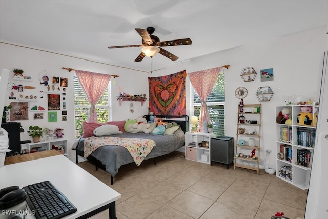 bedroom featuring ceiling fan and light tile patterned flooring