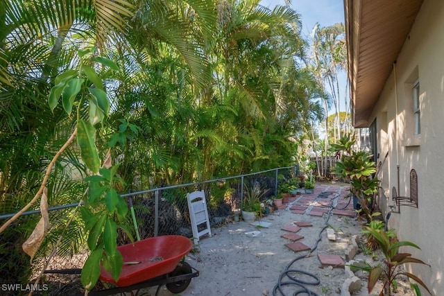 view of patio / terrace featuring fence