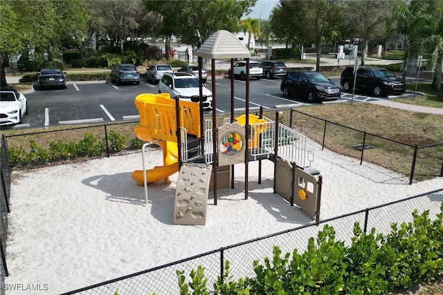 community jungle gym with fence