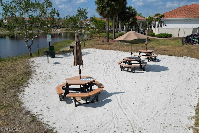 exterior space with a water view