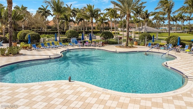 pool with a patio