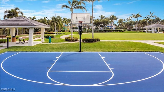 view of basketball court with community basketball court, a lawn, and a gazebo