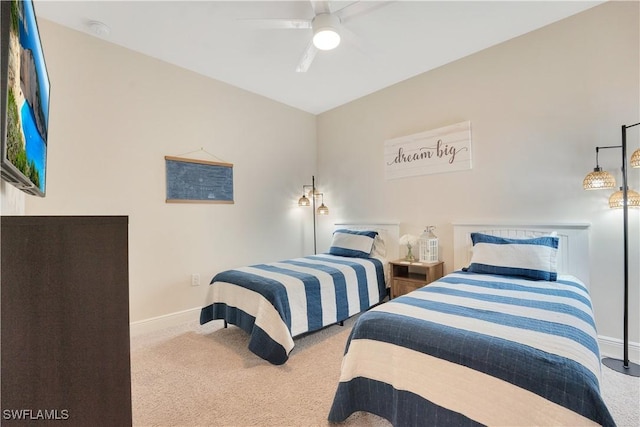 bedroom featuring carpet, a ceiling fan, and baseboards