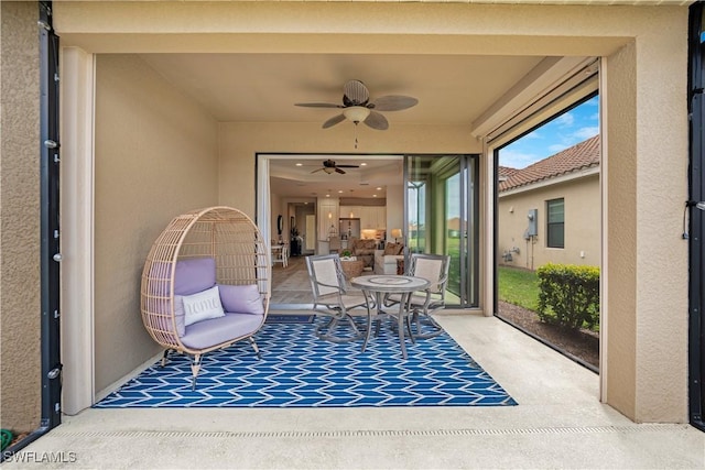 view of patio with a ceiling fan