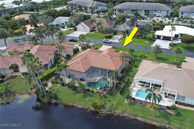 aerial view with a water view and a residential view