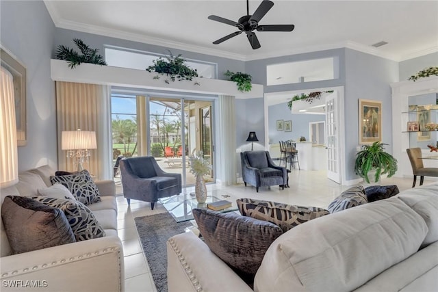 living room featuring light tile patterned floors, ceiling fan, visible vents, and crown molding