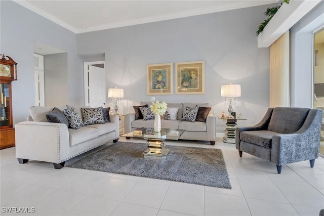 living area with light tile patterned flooring and crown molding