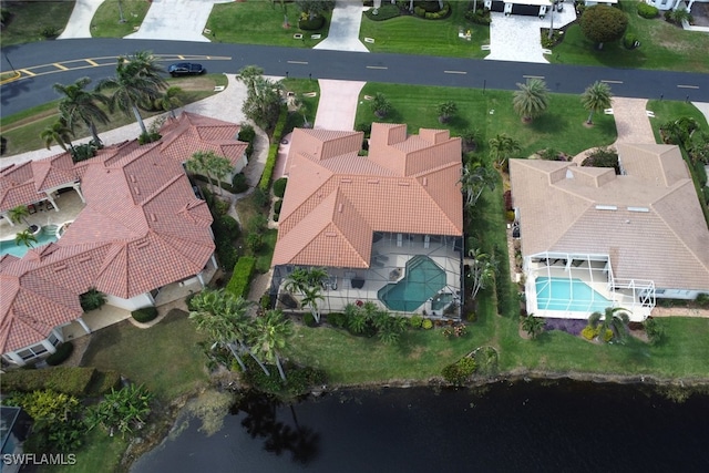 bird's eye view with a water view